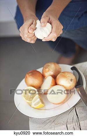 Woman chopping vegetables View Large Photo Image Stock Image - Woman chopping vegetables. Fotosearch