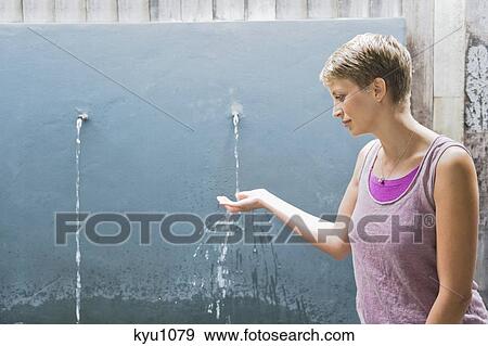 Stock Photo - Woman washing hands. Fotosearch