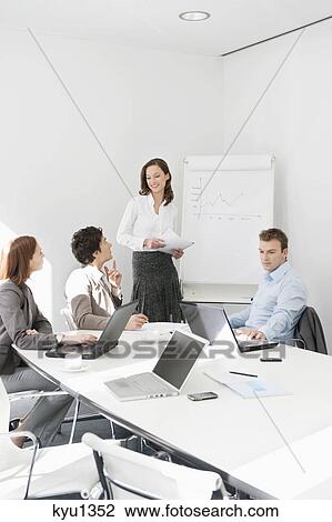 Business executives in a meeting View Large Photo Image Stock Image - Business executives in a meeting. Fotosearch