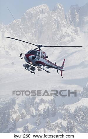 France, Courchevel, helicopter in flight View Large Photo Image Stock Image - France, Courchevel, helicopter in flight. Fotosearch
