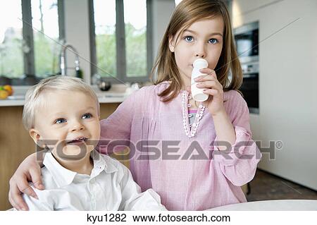 Girl with her brother View Large Photo Image Stock Image - Girl with her brother. Fotosearch