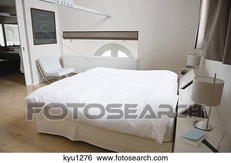 Interiors of a bedroom View Large Photo Image Stock Photograph - Interiors of a bedroom. Fotosearch