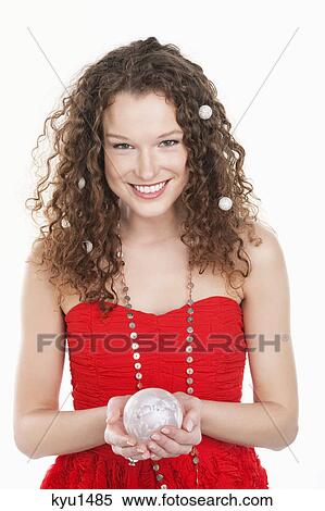 Stock Photography - Portrait of a woman holding a crystal ball. Fotosearch