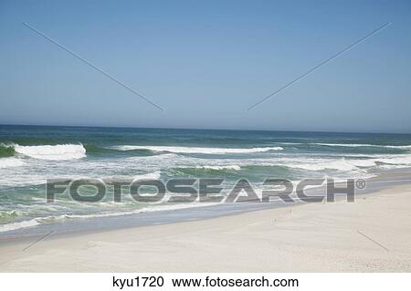 Beautiful view of beach against clear sky View Large Photo Image Stock Image - Beautiful view of beach against clear sky. Fotosearch