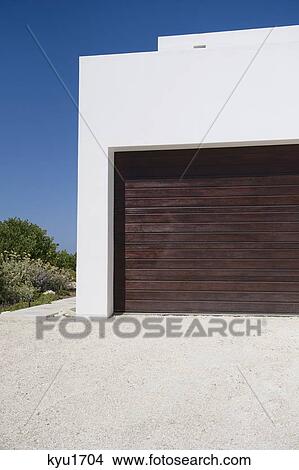 Closed door of a garage View Large Photo Image Picture - Closed door of a garage. Fotosearch