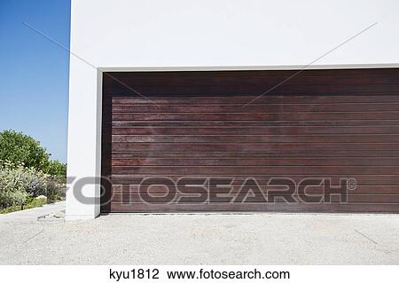 Closed door of a garage View Large Photo Image Stock Image - Closed door of a garage. Fotosearch