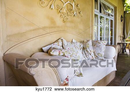 Couch in a veranda View Large Photo Image Stock Image - Couch in a veranda. Fotosearch