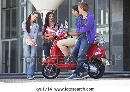 Friends having a conversation View Large Photo Image Picture - Friends having a conversation. Fotosearch