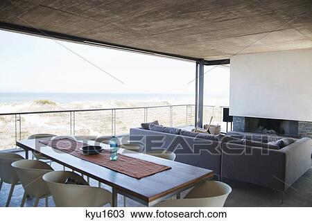 Home interiors with beach in the background View Large Photo Image Stock Image - Home interiors with beach in the background. Fotosearch