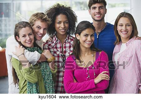 Portrait of multi-ethnic university students standing together View Large Photo Image Picture - Portrait of multi-ethnic university students standing together. Fotosearch