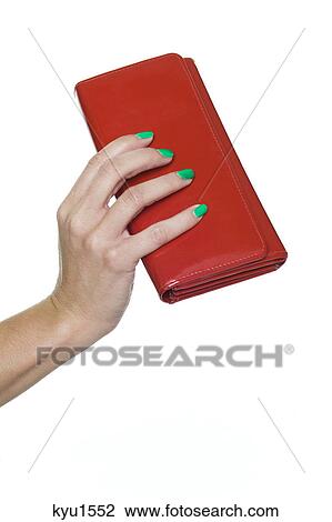 Close-up of woman's hand holding red purse View Large Photo Image Stock Image - Close-up of woman's hand holding red purse. Fotosearch