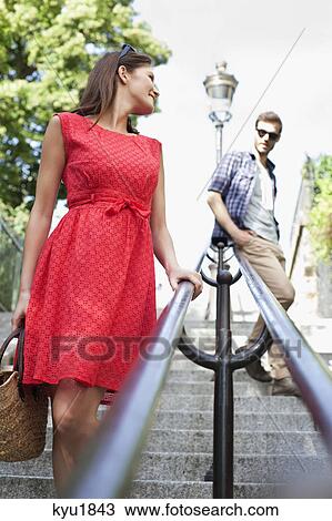 Couple on staircases, Montmartre, Paris, Ile-de-France, France View Large Photo Image Stock Image - Couple on staircases, Montmartre, Paris, Ile-de-France, France. Fotosearch