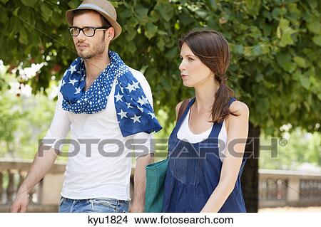 Couple walking together, Paris, Ile-de-France, France View Large Photo Image Picture - Couple walking together, Paris, Ile-de-France, France. Fotosearch