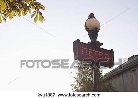 Low angle view of Metro sign, Paris, Ile-de-France, France View Large Photo Image Stock Photo - Low angle view of Metro sign, Paris, Ile-de-France, France. Fotosearch