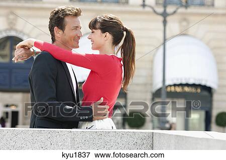 Romantic couple on a street, Paris, Ile-de-France, France View Large Photo Image Stock Photo - Romantic couple on a street, Paris, Ile-de-France, France. Fotosearch