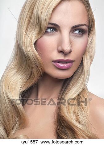 Young woman looking away View Large Photo Image Stock Photo - Young woman looking away. Fotosearch