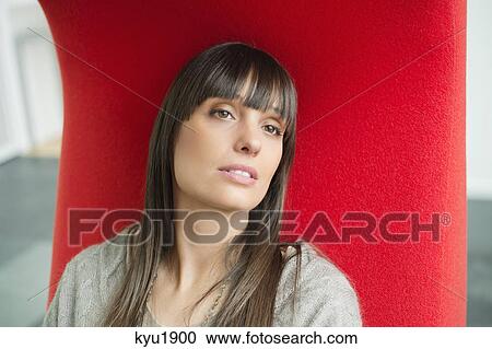 Close-up of a businesswoman looking pensive View Large Photo Image Stock Image - Close-up of a businesswoman looking pensive. Fotosearch