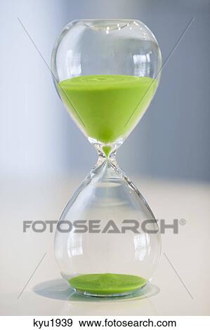 Close-up of an hourglass View Large Photo Image Stock Photo - Close-up of an hourglass. Fotosearch