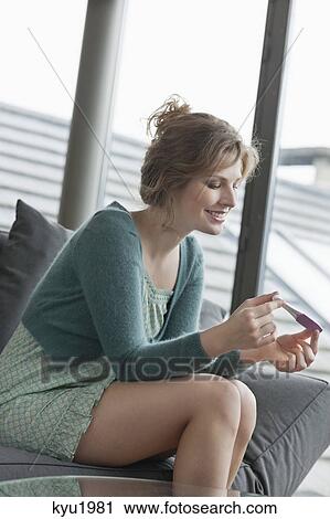 Woman checking her pregnancy View Large Photo Image Stock Image - Woman checking her pregnancy. Fotosearch