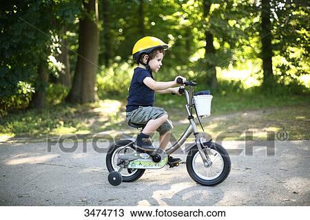 3 years old boy on a P'tit Velib View Large Photo Image Stock Image - 3 years old boy on a P'tit Velib. Fotosearch