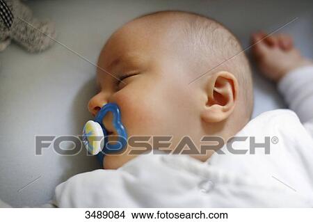 8 months baby boy asleep View Large Photo Image Picture - 8 months baby boy asleep. Fotosearch
