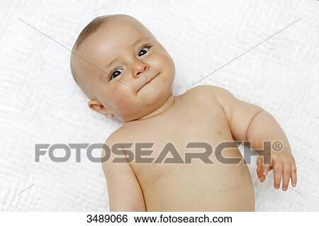 8 months baby boy lying down View Large Photo Image Stock Photograph - 8 months baby boy lying down. Fotosearch