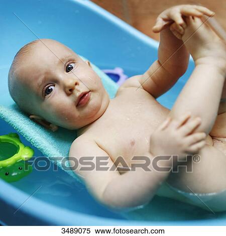 8 months baby boy taking a bath View Large Photo Image Stock Photography - 8 months baby boy taking a bath. Fotosearch