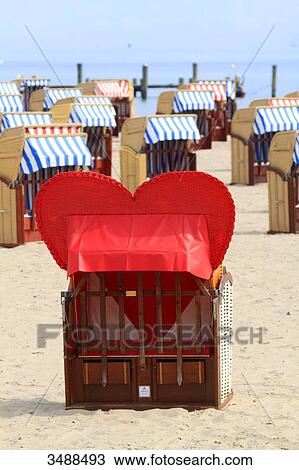 Allemagne, Travemunde. German seaside resort. Beach basket View Large Photo Image Stock Image - Allemagne, Travemunde. German seaside resort. Beach basket. Fotosearch
