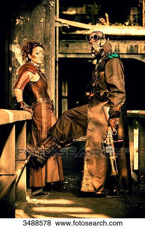 Armed steampunk couple View Large Photo Image Stock Photo - Armed steampunk couple. Fotosearch