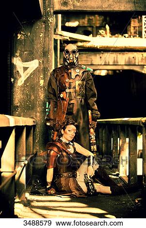 Armed steampunk couple View Large Photo Image Stock Photo - Armed steampunk couple. Fotosearch