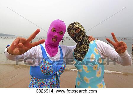 Asia, China, Shandong Province, Qingdao. Huiquan Bay, Beach Number 1. Facekini View Large Photo Image Picture - Asia, China, Shandong Province, Qingdao. Huiquan Bay, Beach Number 1. Facekini. Fotosearch