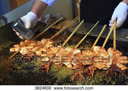 Asia, China, Shanghai. Fried squied View Large Photo Image Stock Image - Asia, China, Shanghai. Fried squied. Fotosearch