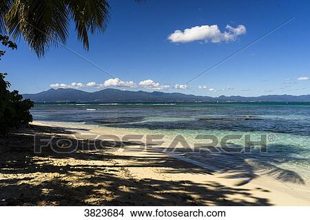 Beach and a view on the Guadeloupe's island, Gosier island, Guadeloupe, France View Large Photo Image Picture - Beach and a view on the Guadeloupe's island, Gosier island, Guadeloupe, France. Fotosearch