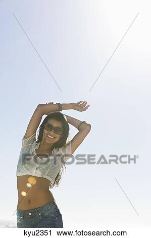 Beautiful woman enjoying on the beach View Large Photo Image Stock Image - Beautiful woman enjoying on the beach. Fotosearch