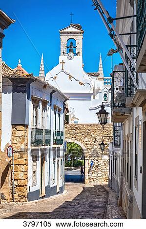 Bell tower of the arch, the gateway to the city of Faro, Algarve region, Portugal View Large Photo Image Stock Photography - Bell tower of the arch, the gateway to the city of Faro, Algarve region, Portugal. Fotosearch