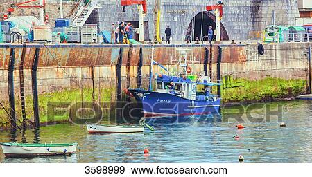 Boat in the port of Castro Urdiales, Spain View Large Photo Image Stock Photo - Boat in the port of Castro Urdiales, Spain. Fotosearch