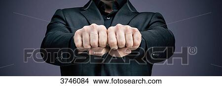 businessman, before the fists View Large Photo Image Picture - businessman, before the fists. Fotosearch
