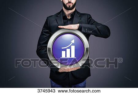 Businessman holding a circle containing the symbol growth curve View Large Photo Image Stock Image - Businessman holding a circle containing the symbol growth curve. Fotosearch