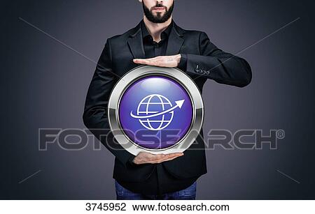 Businessman holding a circle containing the symbol Planet View Large Photo Image Stock Image - Businessman holding a circle containing the symbol Planet. Fotosearch