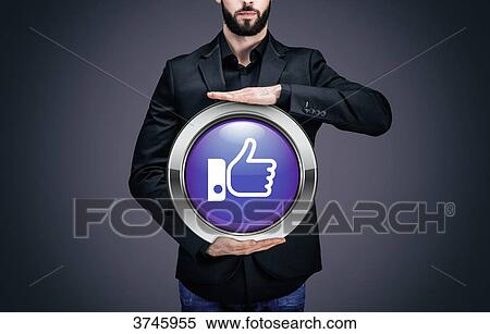 Businessman holding a circle containing the symbol Thumbs up View Large Photo Image Stock Photography - Businessman holding a circle containing the symbol Thumbs up. Fotosearch