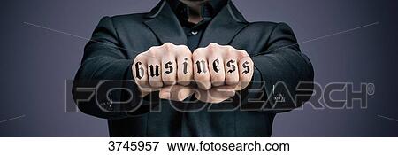Businessman tattooed fists View Large Photo Image Stock Photo - Businessman tattooed fists. Fotosearch