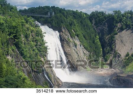 Canada, Province of Quebec. In the neighborhood of Quebec: the Montmorency Falls, 83 meters high View Large Photo Image Stock Photo - Canada, Province of Quebec. In the neighborhood of Quebec: the Montmorency Falls, 83 meters high. Fotosearch