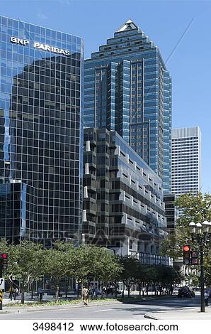 Stock Image - Canada. Province of Quebec, Montreal. The city center. McGill College Avenue. The BNP Paribas building. Fotosearch