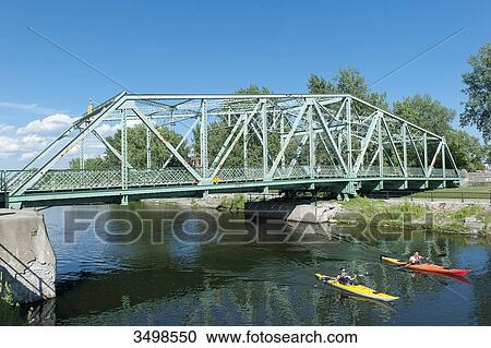 Stock Image - Canada, Province of Quebec. Montreal. Districts of southwest. The Lachine canal site. The Atwater footbridge. Fotosearch