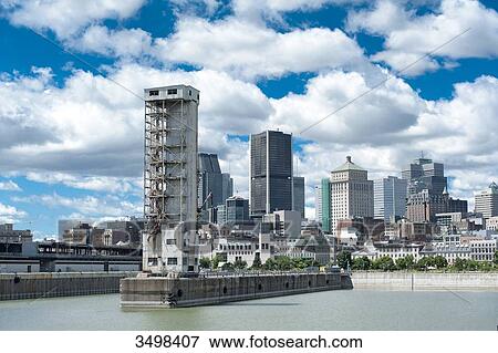 Stock Photo - Canada. Province of Quebec, Montreal. The city seen from the old harbour. Fotosearch