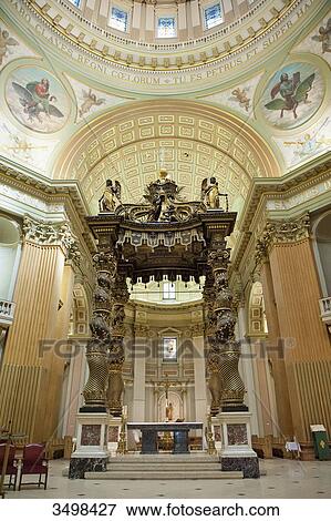 Canada. Province of Quebec, Montreal. The city center. The Marie Reine du Monde cathedral. The choir and the canopy of the high altar View Large Photo Image Stock Photo - Canada. Province of Quebec, Montreal. The city center. The Marie Reine du Monde cathedral. The choir and the canopy of the high altar. Fotosearch