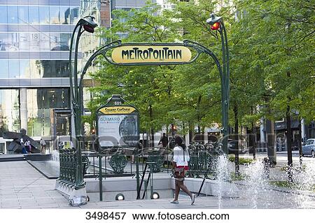 Stock Photo - Canada. Province of Quebec, Montreal. The international district. Place Victoria. The subway station, Hector Guimard's authentic Parisian subway station. Fotosearch