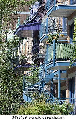 Canada, Province of Quebec. Montreal. Plateau Mont Royal district. Rachel street. Outdoor wrought iron staircases View Large Photo Image Stock Photo - Canada, Province of Quebec. Montreal. Plateau Mont Royal district. Rachel street. Outdoor wrought iron staircases. Fotosearch