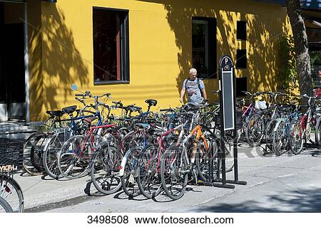 Canada, Province of Quebec. Montreal. Plateau Mont Royal district. Breboeuf street. In front of The House of the Cyclists View Large Photo Image Stock Photo - Canada, Province of Quebec. Montreal. Plateau Mont Royal district. Breboeuf street. In front of The House of the Cyclists. Fotosearch