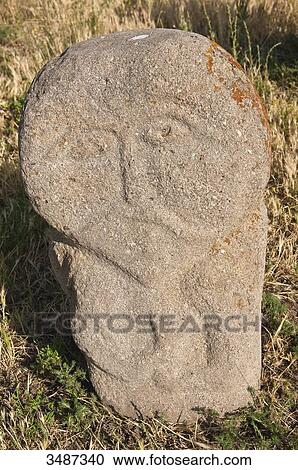 Stock Image - Central Asia, Kyrgyzstan, Chuy province, Burana Tower (11th), archeological site, grave marks (balbal) from the 7th and 11th century representing worthy Turkish soldiers. Fotosearch